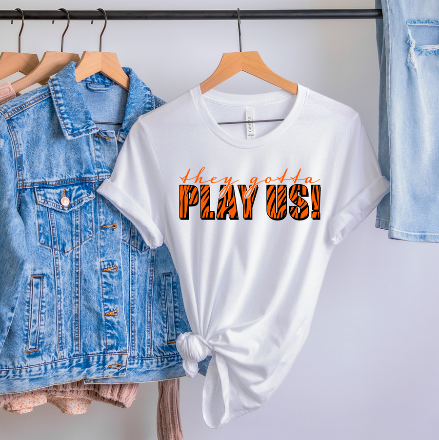 They Gotta Play Us Unisex T-shirt